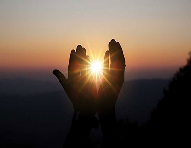 sun-through-hands